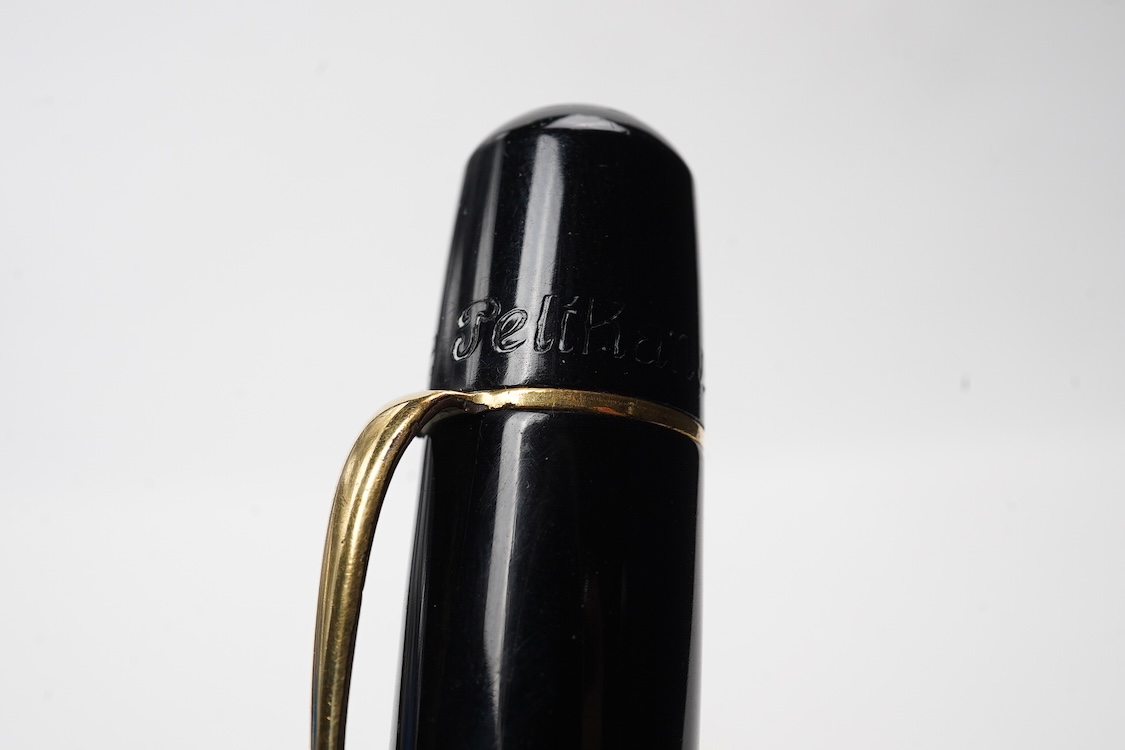 A Pelikan 100N fountain pen fitted with a 14ct. gold Pelikan nib